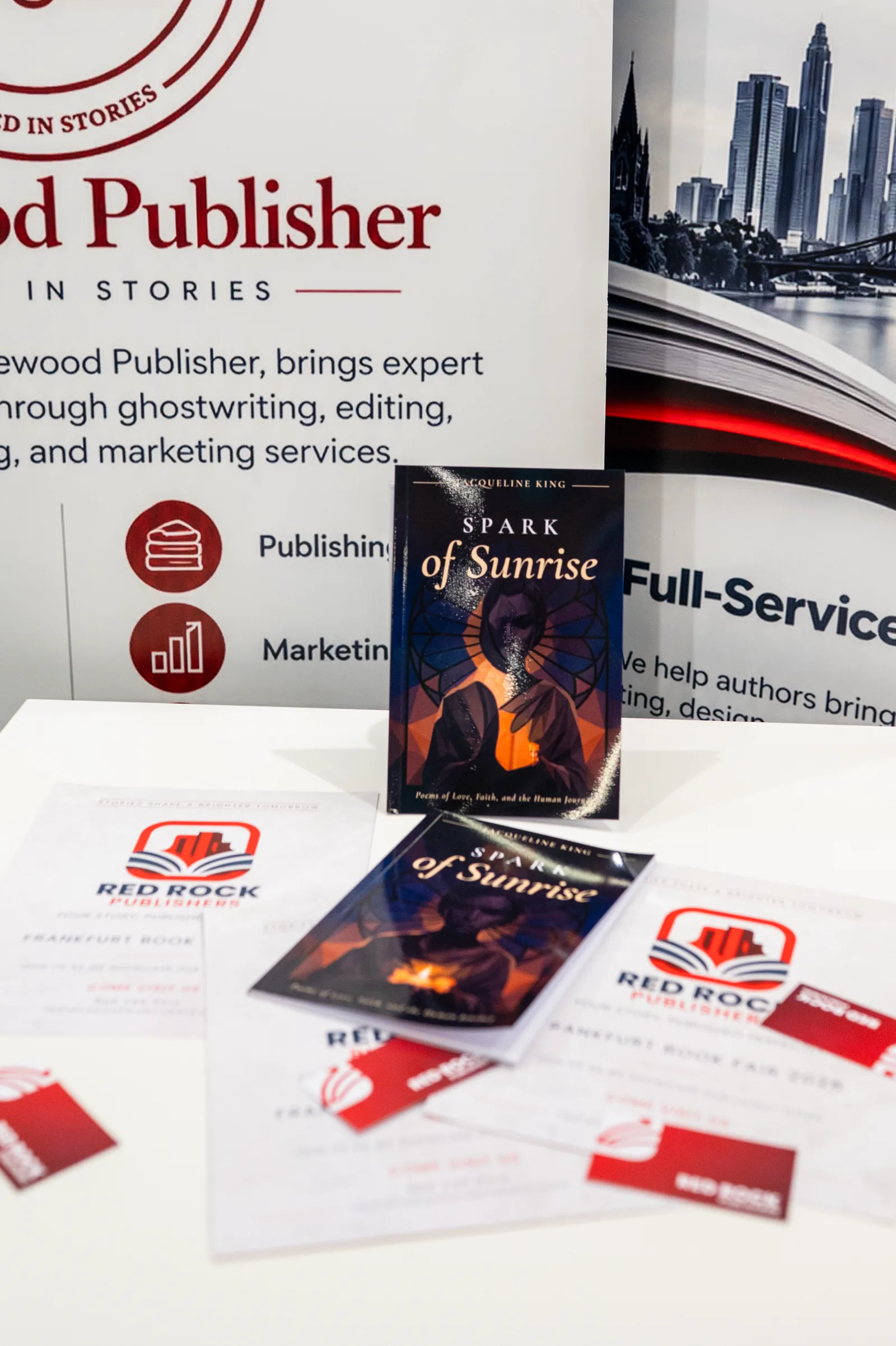 Spark of Sunrise displayed with book fair materials